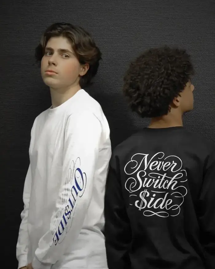 Manches longues blanche et noire Never Switch $ide portées dos à dos